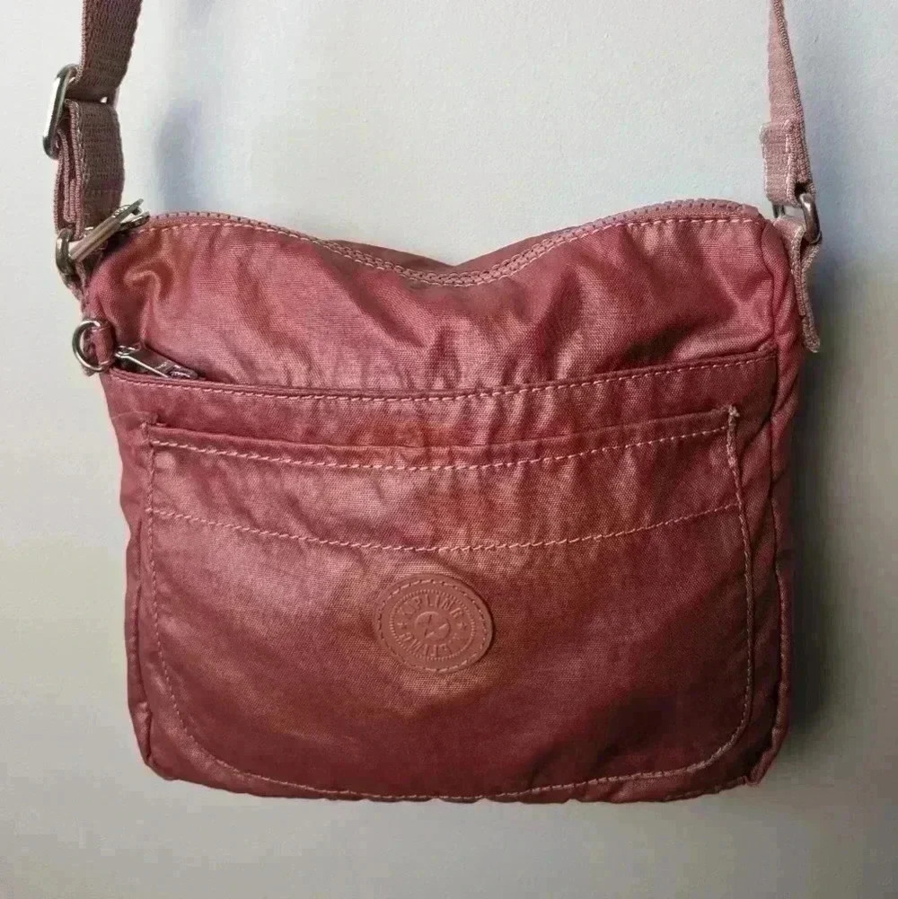 KIPLING Pink crossbody small bag Perfect size to travel, 4 pockets